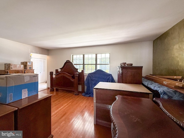 bedroom with light wood finished floors