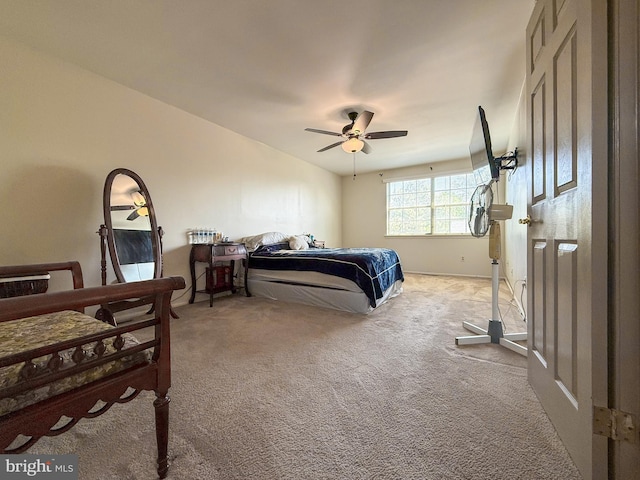 bedroom with carpet flooring and a ceiling fan