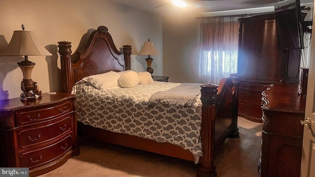 bedroom featuring a ceiling fan and light carpet