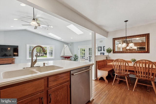 113 Winchester Way, Harleysville, PA 19438 - kitchen with french doors, appliances with stainless steel finishes, hanging light fixtures, a sink, and light wood-style floors