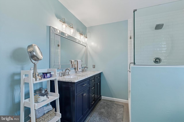 113 Winchester Way, Harleysville, PA 19438 - full bathroom featuring a sink, double vanity, tiled shower, and wood finished floors