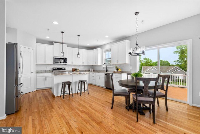 161 Stonecrest Cir, Keedysville, MD 21756 - dining area featuring light wood finished floors, recessed lighting, and a chandelier