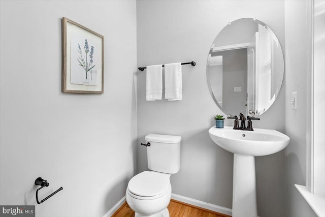 161 Stonecrest Cir, Keedysville, MD 21756 - half bath with baseboards, wood finished floors, and toilet