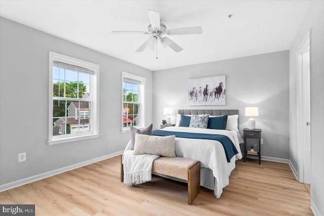 161 Stonecrest Cir, Keedysville, MD 21756 - bedroom with light wood-style flooring, baseboards, and a ceiling fan