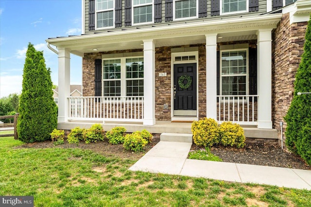161 Stonecrest Cir, Keedysville, MD 21756 - entrance to property featuring a porch, stone siding, and a yard