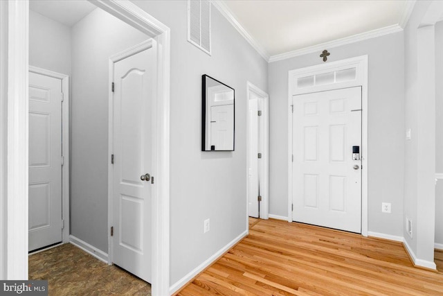 161 Stonecrest Cir, Keedysville, MD 21756 - foyer entrance featuring ornamental molding, baseboards, and light wood-type flooring
