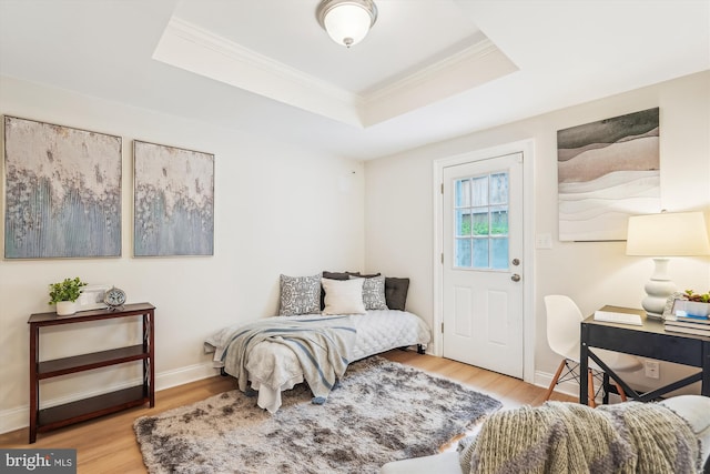 519 Somerset Pl NW, Washington, DC 20011 - bedroom featuring a raised ceiling, wood finished floors, ornamental molding, baseboards, and a desk