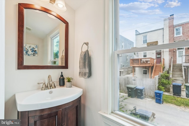 519 Somerset Pl NW, Washington, DC 20011 - bathroom with a sink and vaulted ceiling
