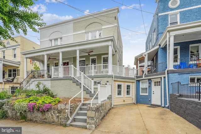 519 Somerset Pl NW, Washington, DC 20011 - multi unit property featuring stairway, ceiling fan, a porch, and brick siding