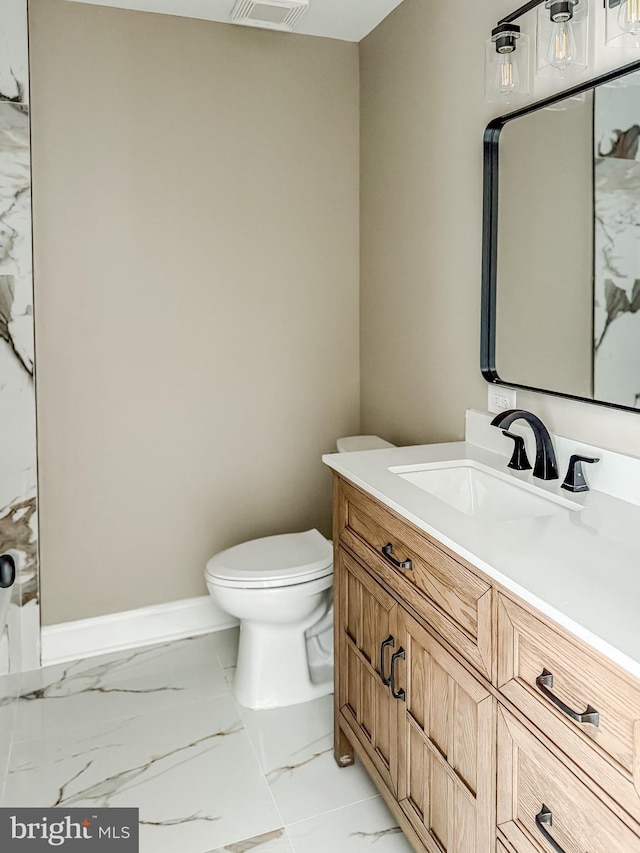 204 Barclay St, Burlington, NJ 08016 - bathroom with vanity, baseboards, toilet, and marble finish floor