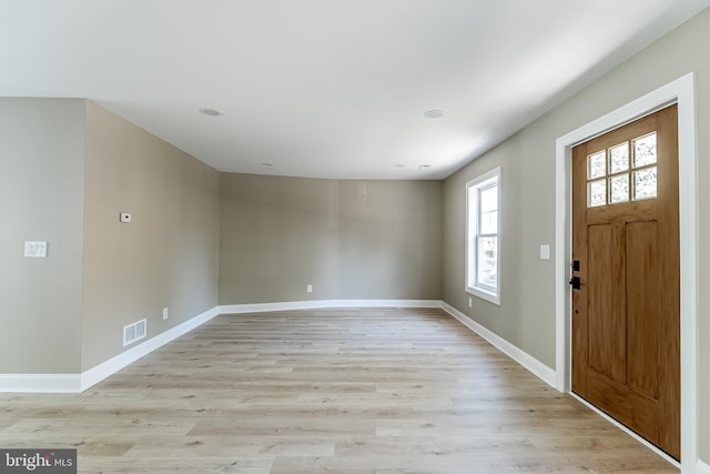 204 Barclay St, Burlington, NJ 08016 - entrance foyer with baseboards, light wood finished floors, and visible vents