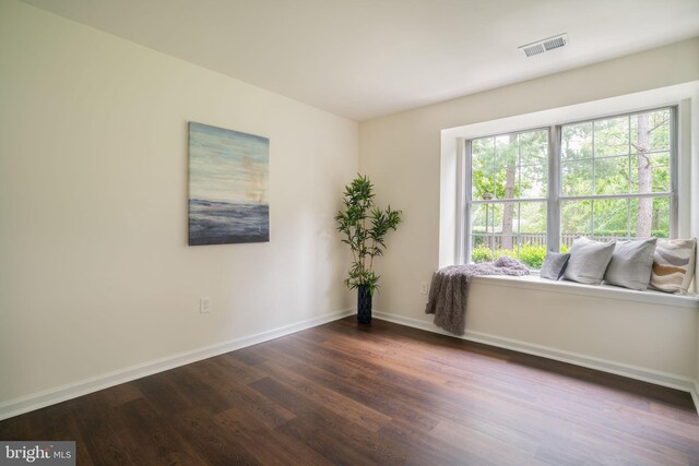 8607 Beekman Pl Unit 7B, Alexandria, VA 22309 - empty room featuring dark wood-style flooring and baseboards