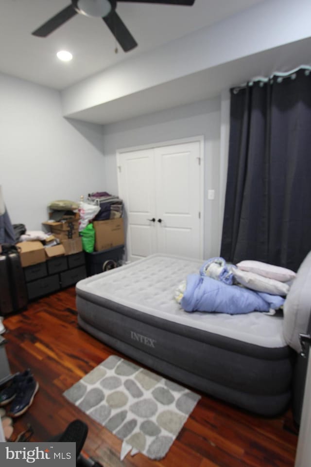 bedroom featuring ceiling fan, a closet, recessed lighting, and wood finished floors