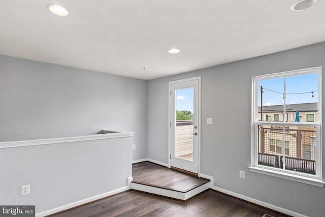6101 Enquirer St, Hyattsville, MD 20782 - entryway featuring dark wood finished floors, recessed lighting, and baseboards