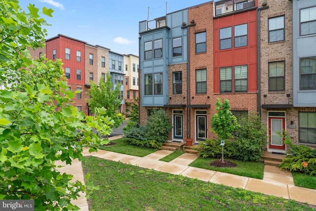 6101 Enquirer St, Hyattsville, MD 20782 - view of front of home featuring brick siding and a residential view