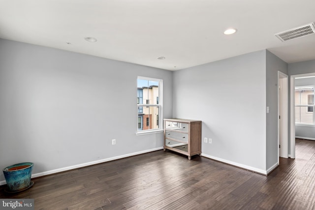 6101 Enquirer St, Hyattsville, MD 20782 - unfurnished room with dark wood-style floors, baseboards, and recessed lighting