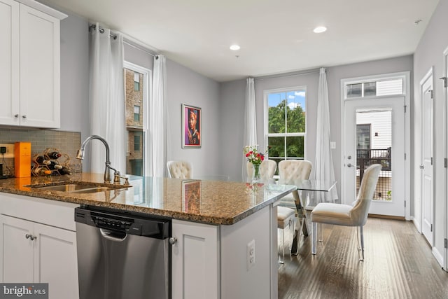 6101 Enquirer St, Hyattsville, MD 20782 - kitchen with stainless steel dishwasher, a sink, a peninsula, white cabinetry, and recessed lighting