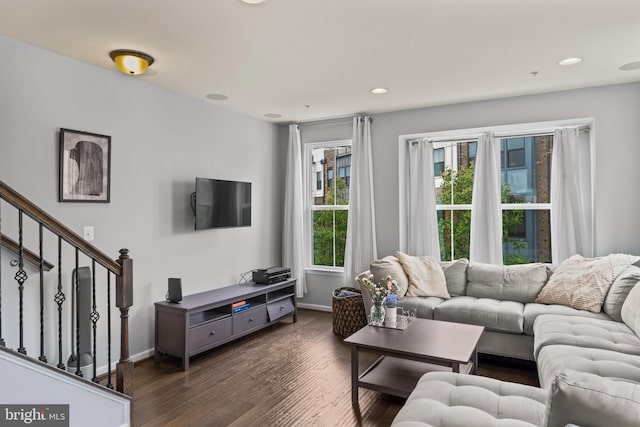 6101 Enquirer St, Hyattsville, MD 20782 - living room with dark wood finished floors, baseboards, recessed lighting, and stairway
