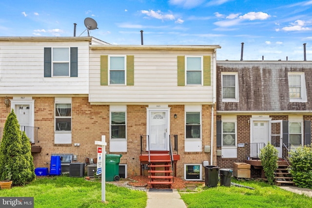 565 W Diamond Ave Unit 27, Gaithersburg, MD 20877 - multi unit property with brick siding, cooling unit, and entry steps