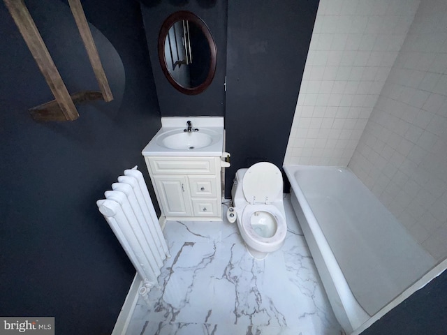 4702 Kernwood Ave, Baltimore, MD 21212 - bathroom with marble look tile flooring, vanity, toilet, and baseboards
