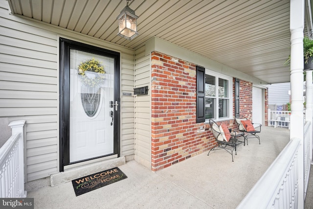 48 Evergreen Ln, Burlington, NJ 08016 - entrance to property with a porch and brick siding