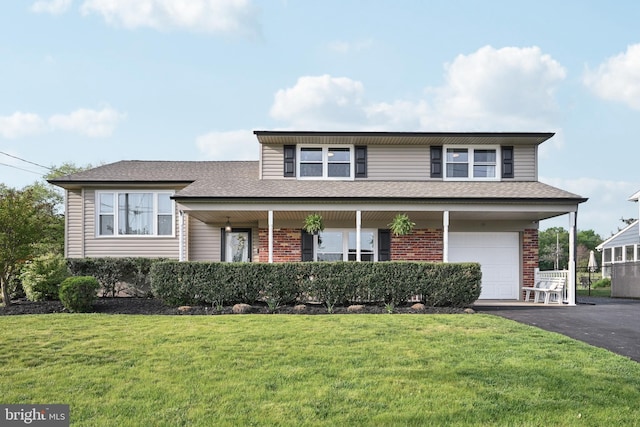 48 Evergreen Ln, Burlington, NJ 08016 - tri-level home featuring driveway, a garage, brick siding, a front lawn, and a shingled roof