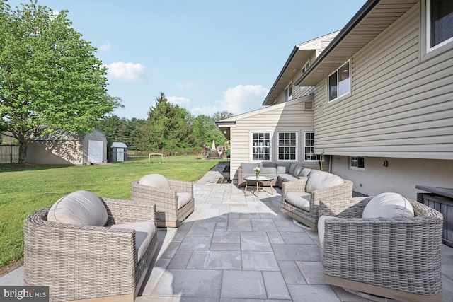 48 Evergreen Ln, Burlington, NJ 08016 - view of patio / terrace featuring a storage unit, an outdoor structure, and an outdoor living space