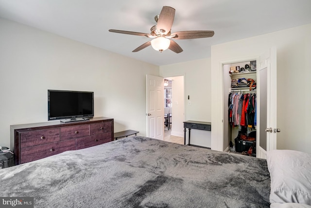 bedroom featuring a closet and a ceiling fan