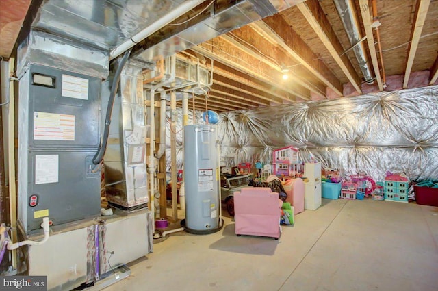 unfinished below grade area featuring water heater