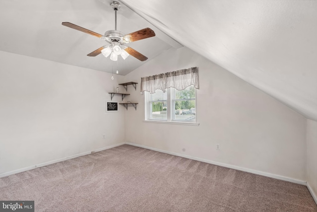 bonus room with a ceiling fan, baseboards, carpet, and lofted ceiling