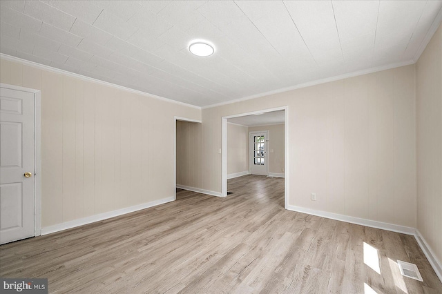 2708 Old Ocean City Rd, Salisbury, MD 21804 - empty room featuring wood finished floors, crown molding, and baseboards