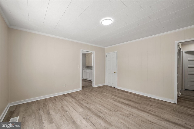 2708 Old Ocean City Rd, Salisbury, MD 21804 - unfurnished room with light wood-type flooring, ornamental molding, and baseboards