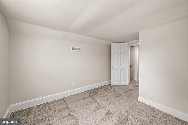 2708 Old Ocean City Rd, Salisbury, MD 21804 - empty room featuring carpet, baseboards, and lofted ceiling