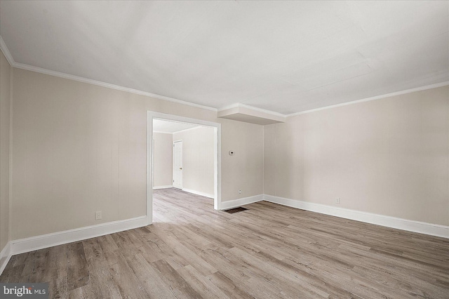 2708 Old Ocean City Rd, Salisbury, MD 21804 - unfurnished room with wood finished floors, baseboards, and ornamental molding