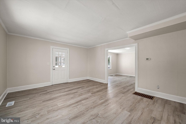 2708 Old Ocean City Rd, Salisbury, MD 21804 - spare room featuring wood finished floors, healthy amount of natural light, baseboards, and ornamental molding