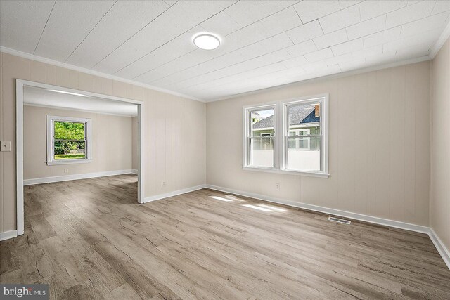 2708 Old Ocean City Rd, Salisbury, MD 21804 - empty room with crown molding, wood finished floors, and baseboards
