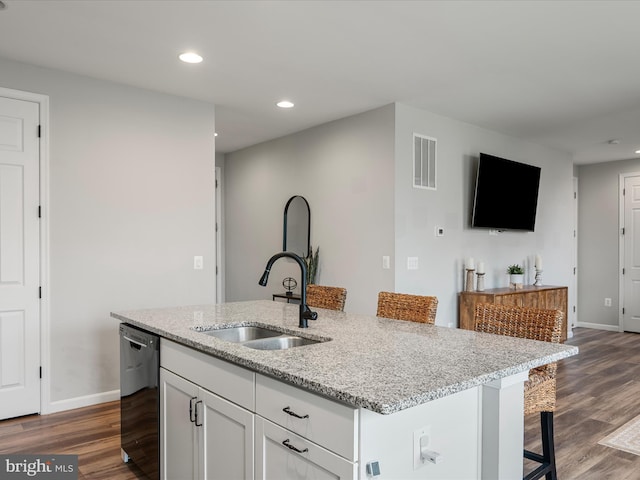 kitchen with visible vents, a sink, black dishwasher, and recessed lighting