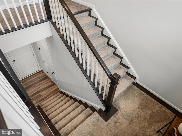 staircase with baseboards
