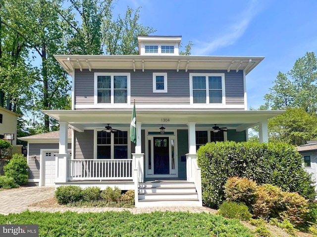 view of front of home with a porch, ceiling fan, driveway, and an attached garage