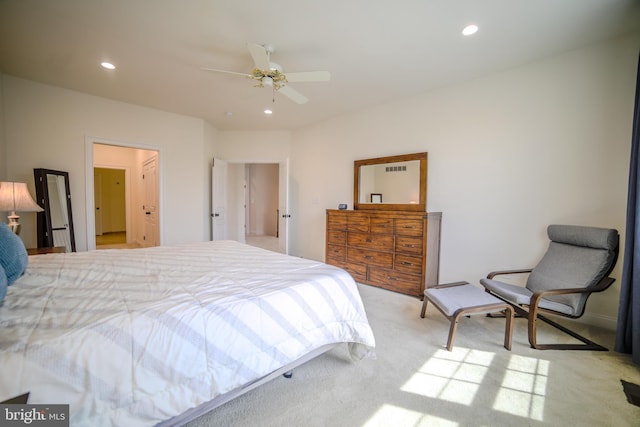 carpeted bedroom with recessed lighting, a ceiling fan, and visible vents