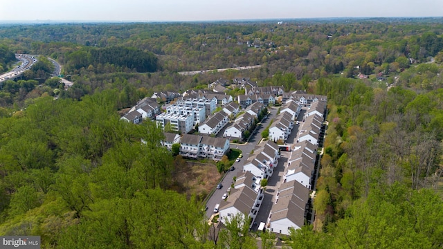 bird's eye view with a residential view and a forest view