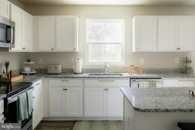 300 Coville St, Middletown, VA 22645 - kitchen with stainless steel appliances, white cabinetry, and a sink