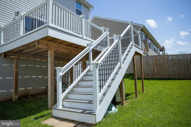 300 Coville St, Middletown, VA 22645 - view of home's exterior featuring a lawn, fence, stairway, and a deck