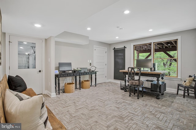 office area featuring baseboards, recessed lighting, and a barn door