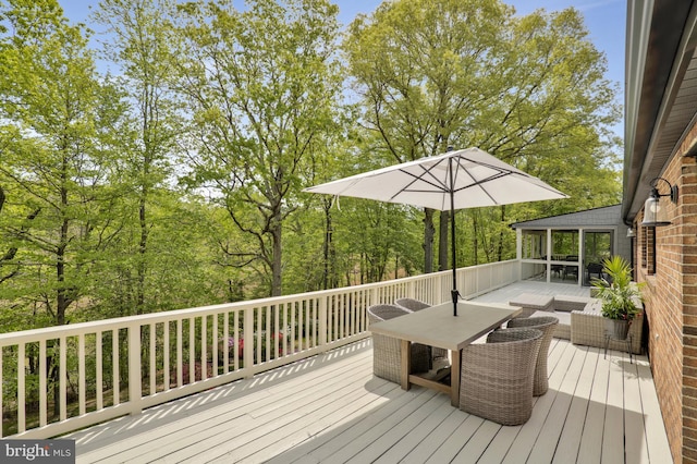 deck featuring outdoor dining space