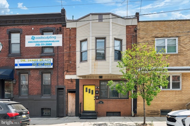 view of building exterior featuring entry steps
