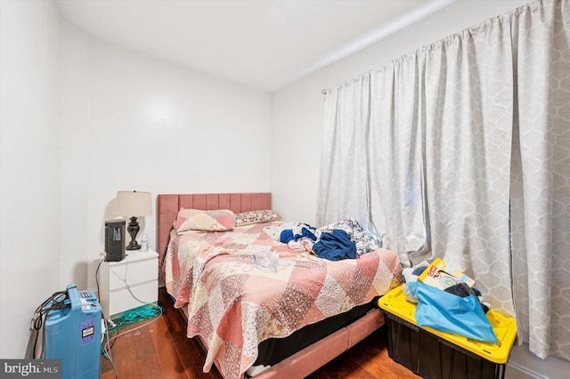 bedroom featuring hardwood / wood-style flooring
