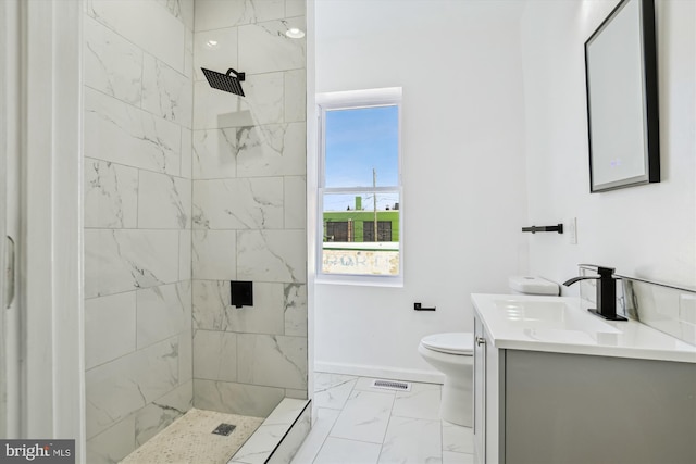 full bathroom with vanity, visible vents, marble finish floor, toilet, and tiled shower