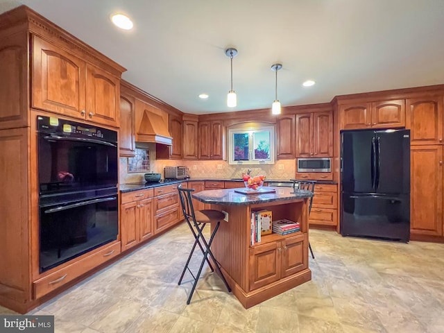 kitchen with brown cabinetry, black appliances, and custom range hood