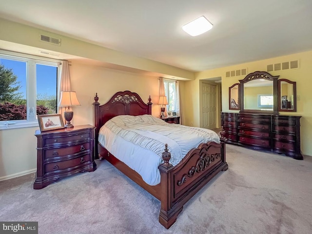 bedroom featuring visible vents and carpet